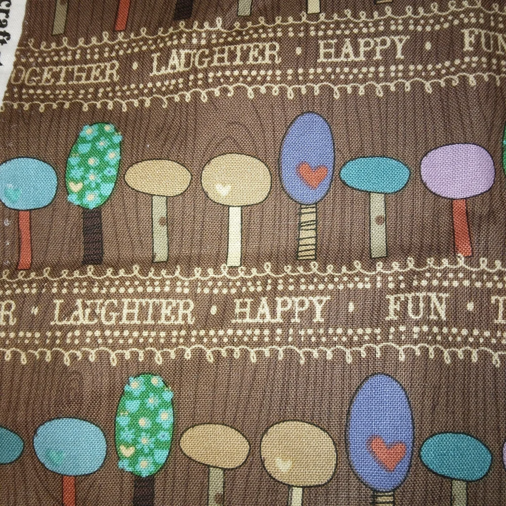FABRIC Fun and charming stylized trees on Brown, an updated MCM feel